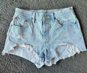 Levi’s 501 denim light wash shorts with distressing, size 29 thumbnail 1