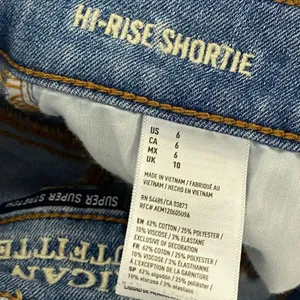 American Eagle Hi-Rise Light Wash Blue Denim‎ Raw Hem Shorts Women's Size 6 thumbnail 7