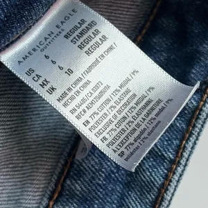 American Eagle Outfitters • Medium Wash Destructed Mom Jeans thumbnail 5