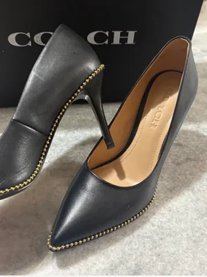 Coach black leather pointed toe pumps with gold studs along the edge, size US 6.5 thumbnail 3
