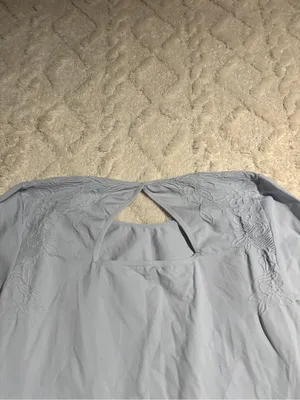 Blue women’s work out longsleeve no size tag fits a large thumbnail 2