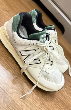 New Balance 574 Women’s Size 10 - Mens Size 8.5 thumbnail 1