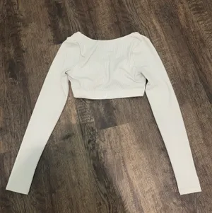 Alo ribbed defined long sleeve bra top in ivory thumbnail 6