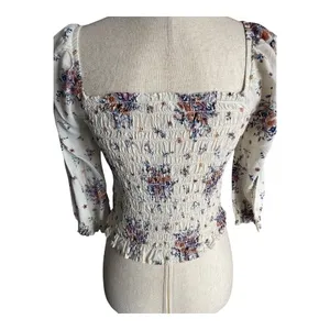 REWIND-CREAM COLOR FLORAL SMOCKED TOP-WOMENS SIZE SMALL Gorgeous top, fro t and back smocking, women’s size small, excellent condition Measurements: Bust: armpit to armpit 14-18 inches Length: shoulder seam to bottom 17 inches thumbnail 7