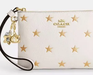Authentic COACH Leather glitter stars wristlet and 2 charms set in box 🎁 thumbnail 1