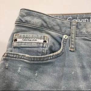 Calvin Klein Distressed Jean Mini Skirt thumbnail 3