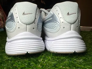 Nike running sneakers. 6 youth, women’s 7.5. Neutral colors. So pretty. thumbnail 6