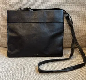 The Sak Black Messenger Bag 100% leather zipper and magnetic closure thumbnail 1