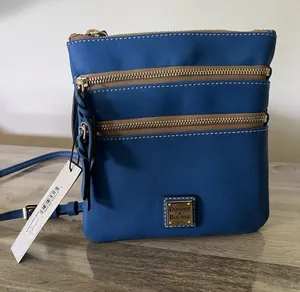 Dooney & Bourke Light Blue Leather North South Triple Zip Crossbody Bag NWT thumbnail 1