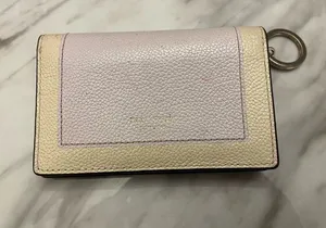 kate spade Two-Tone Pebbled Leather Bifold Wallet in Purple and Cream thumbnail 1