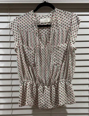 ISÄN Sleeveless White Pleated Peplum Blouse with Red & Blue Dot Print thumbnail 1