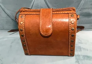 Vintage mini genuine leather crossbody bag in tan color thumbnail 1