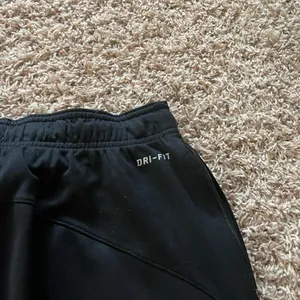 Nike dri-fit boot cut sweatpants size small thumbnail 6