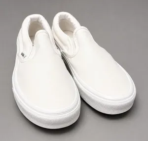 Vans Classic Slip-On White Canvas Sneakers Men’s 6.5 / Women’s 8 thumbnail 1