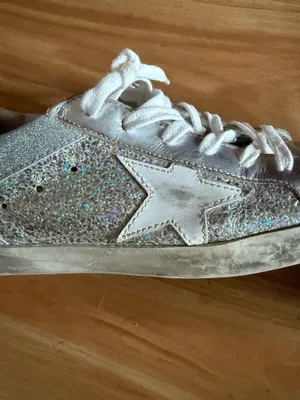 GOLDEN GOOSE Super-Star Iridescent and Glitter Leather Sneakers - Sz 38 - US 7 1/2 These are in good condition with light wear throughout. They are a pretty hard to find but super cute style. They have like holographic leather and glitter areas. Please see pics for details. Metallic leather upper Round toe Lace-up closure White leather star Cushioned insole; unlined Rubber sole Made in Italy thumbnail 6