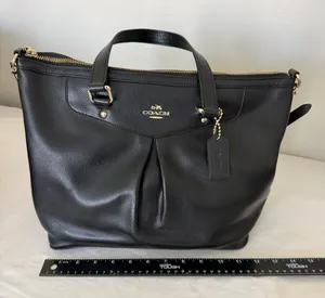 Woman’s coach bag thumbnail 3