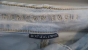 American Eagle Outfitters next level stretch hi-rise shortie jeans in light wash blue size 6. thumbnail 4