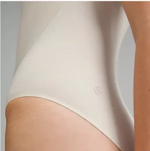 lululemon athletica High-Neck One-Piece bodysuit in Cream M thumbnail 3