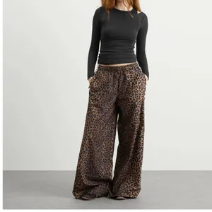 ADIDAS leopard printed oversized track pants thumbnail 3