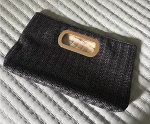 Black and gold handbag thumbnail 1