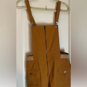 Free People New Cascade jumpsuit In the color Amber. Size:S thumbnail 4