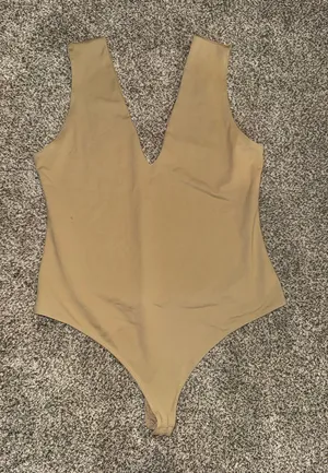 Intimately Free People Keep It Sleek Sleeveless Thong Bodysuit thumbnail 1