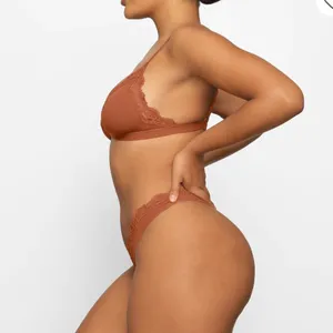SKIMS NTW/ FITS EVERYBODY LACE TRIANGLE BRALETTE, Color bronze tan. thumbnail 3