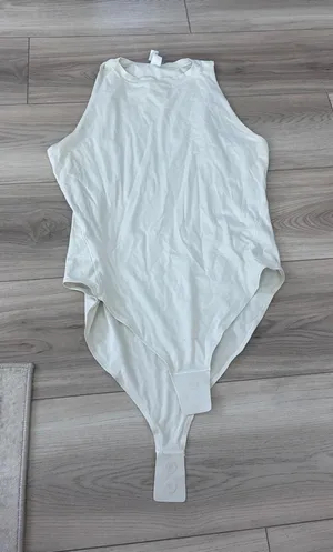 Lululemon Wundermost Ultra Soft Nulu High Neck Sleeveless Bodysuit White L/G thumbnail 1
