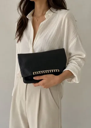 Anthropologie Black Leather Foldover‎ Clutch Bag thumbnail 1