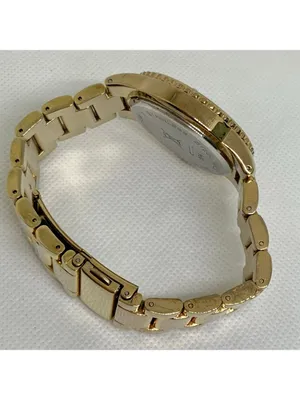 Women’s gold tone watch 38mm round quartz analog mop dial size 7” running thumbnail 9