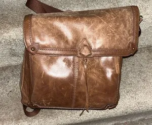 The Sak brown leather backpack in GUC. thumbnail 1