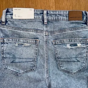 American Eagle Jeans Strigid Ripped Mom jeans size 0 25w thumbnail 4