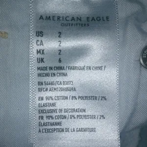 American Eagle 2 High Rise Shorty Jeans Light Wash Raw Hem Shorts thumbnail 4