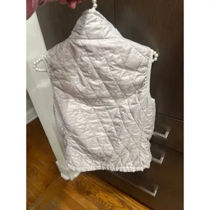 Patagonia Women's Nano Puff Vest in a pale grey‎ women's small thumbnail 4