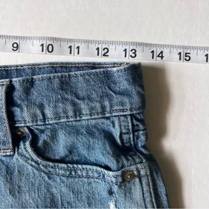 Gap denim button fly high rise cheeky shorts size 0/25 Denim thumbnail 7