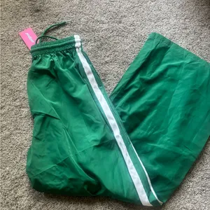 Edikted Green Track Pants with White Stripe thumbnail 1