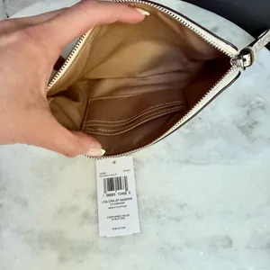 NWT Coach Large Corner Zip Wristlet in Vintage Newspaper Print thumbnail 7