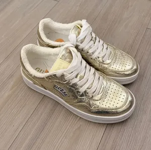 Metallic Gold Guess Sneakers Size 7 thumbnail 1