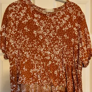 Altar’d State Orange and White Flower Peplum Top thumbnail 1