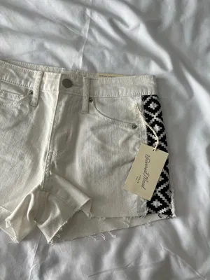 White High-Rise Raw Hem Shorts With Black Tribal Detail thumbnail 2