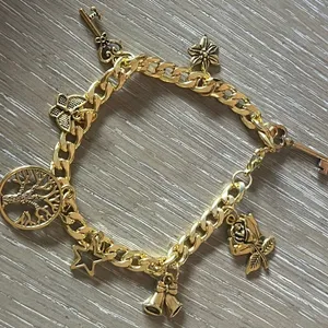 Gold Charm Bracelet with Intricate Details thumbnail 3