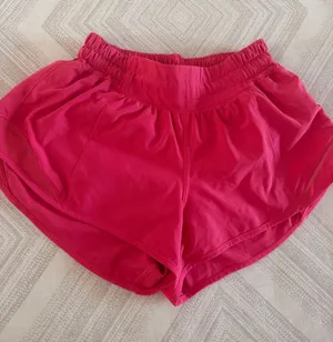 Lululemon Hotty Hot Shorts Low Rise 2.5” Bright Pink Women’s Size 2 thumbnail 1