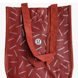 Lululemon reusable shopping bag.
Button closure. thumbnail 3