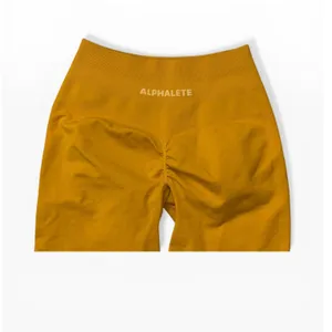 Alphalete Amplify Mustard Yellow Seamless Scrunch Butt Biker Shorts Womens Small thumbnail 3