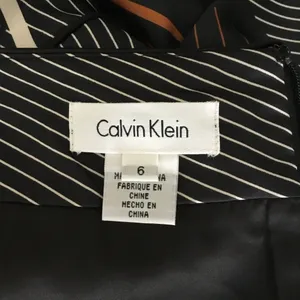 Calvin Klein Womens Skirt Sz 6 Silky Satin Pleated Knee Length Packets Black. thumbnail 9