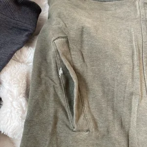 Lululemon olive green asymmetrical zip up thumbnail 3