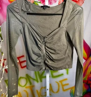 X64. Ambiance - Olive green mesh crop long sleeve top with zipper detail. thumbnail 1