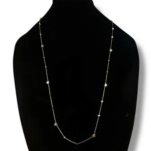 Frenzy long gold tone station stars and crystals necklace thumbnail 2