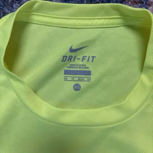Nike Women's Neon Yellow Short Sleeve Tee thumbnail 2
