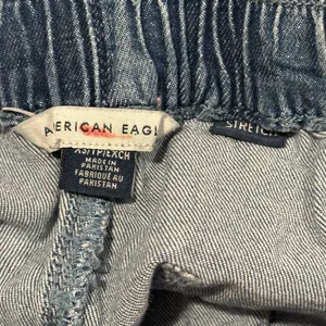 American Eagle Outfitters Women's Ruffle Denim Shorts thumbnail 12